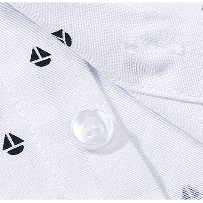 White shirt with black sailboat pattern and pearl button