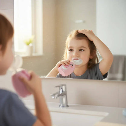Child brushing teeth with a mirror reflection showing a sink and faucet.